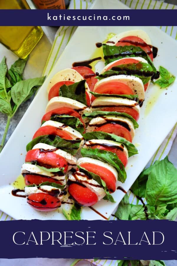 Slices of tomatoes, mozzarella cheese, and basil with balsamic on top and recipe title text on image for Pinterest.