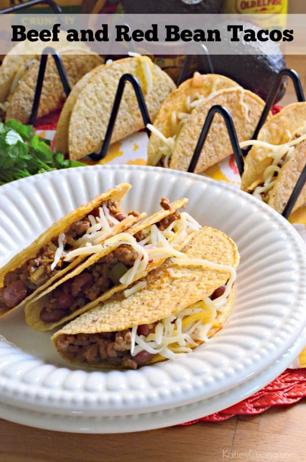 Three Beef and Red Bean crunchy tacos on a white plate with recipe title on image.