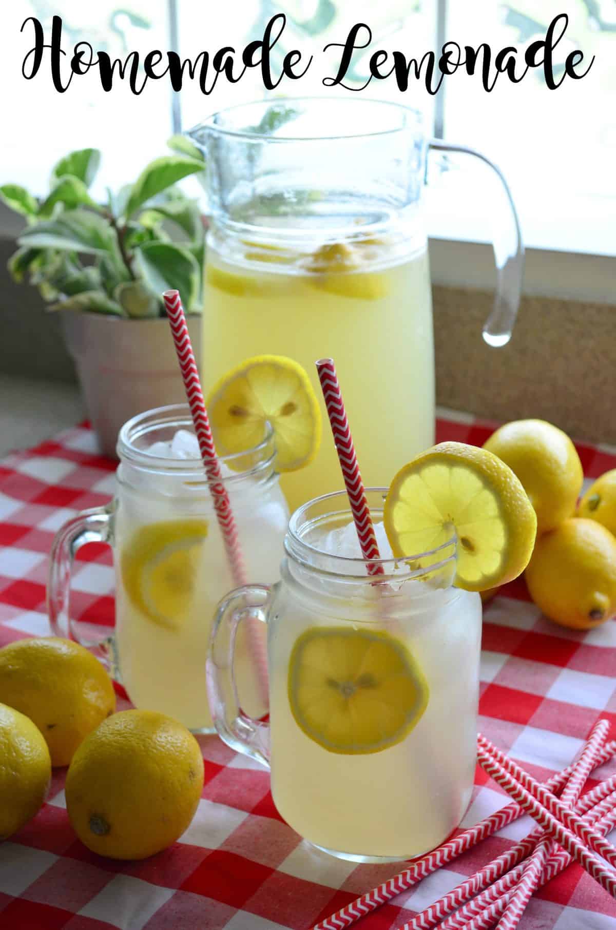 Pitcher of lemonade behind two mason jars of lemonade with red straws and lemon wheels with title text.