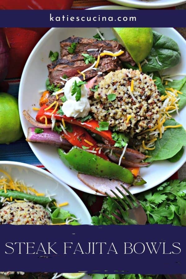 Top view of a white bowl filled with spinach, quinoa, vegetables, and steak with recipe title text on image.