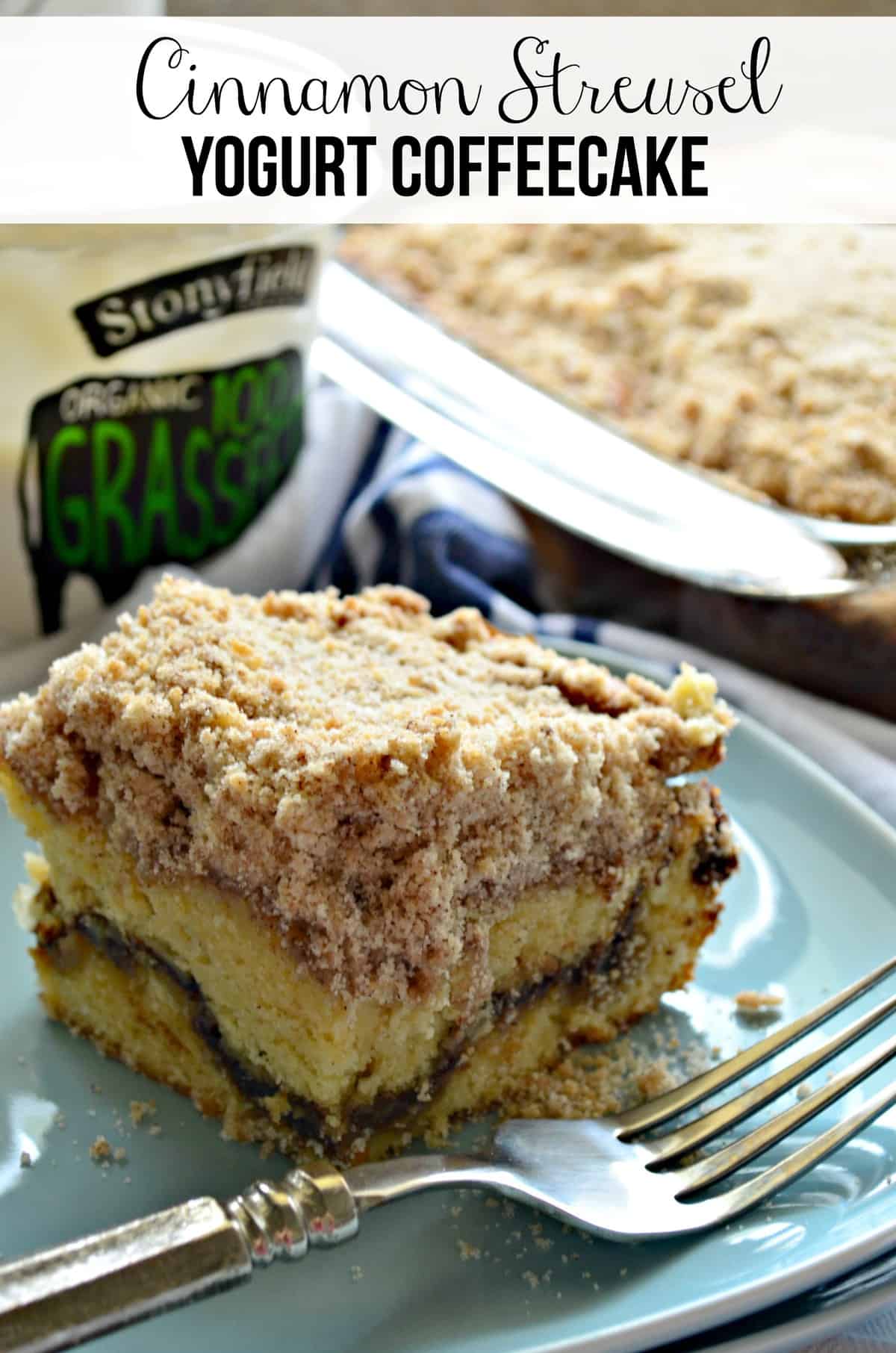 closeup side view of square of Coffeecake topped with crumbled sugar on blue plate with title text.