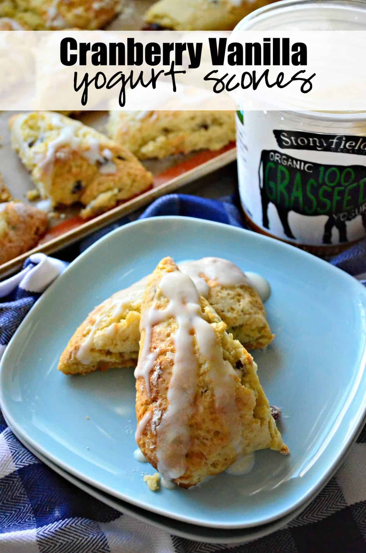 sliced and stacked scone with white glaze icing drizzled on light blue plate with title text.