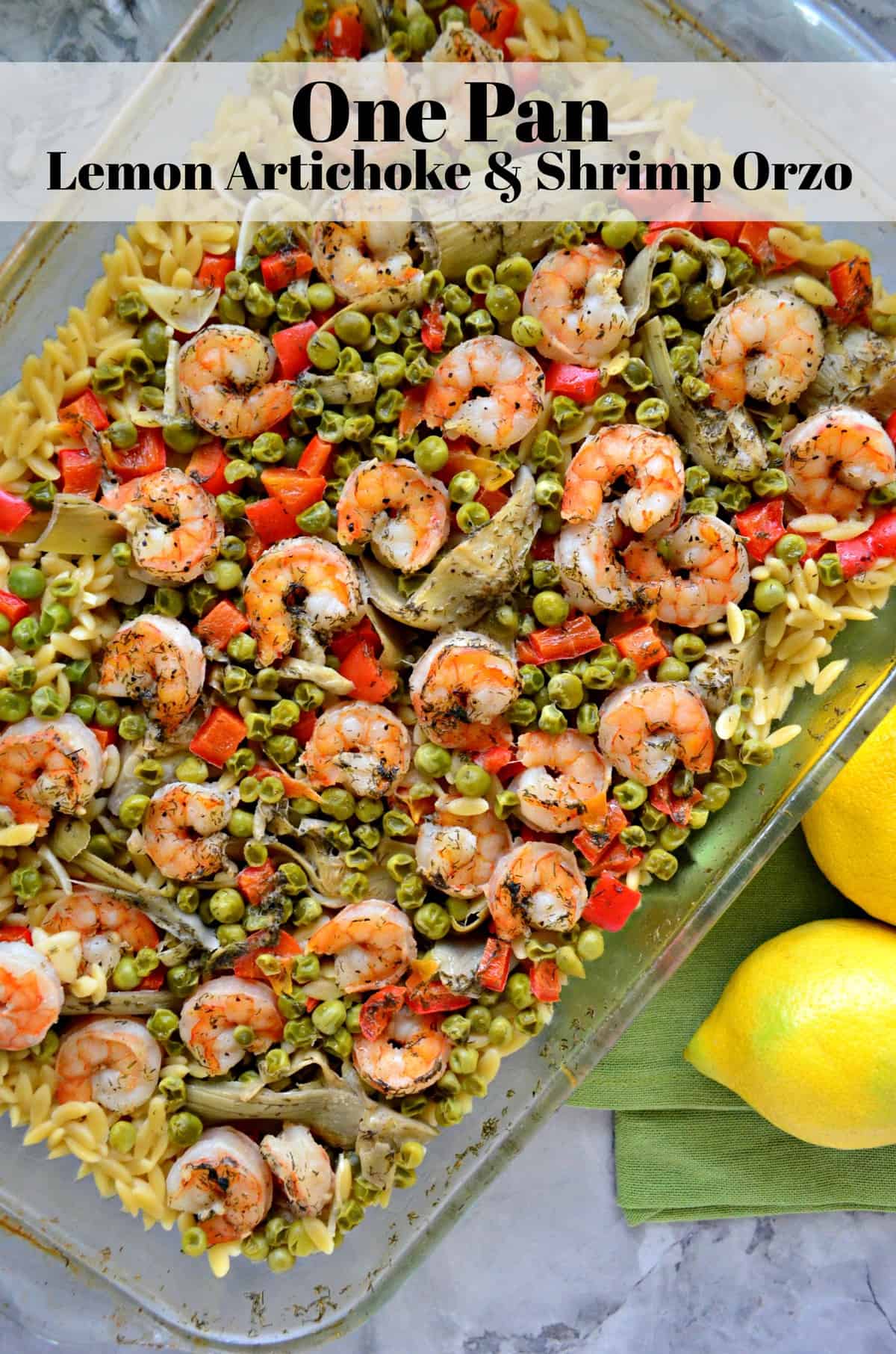 top view of shrimp, bell pepper, peas, and orzo in a glass dish with title text.