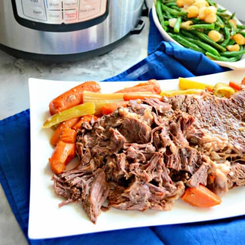 White platter filled with shredded beef, carrots, and celery.