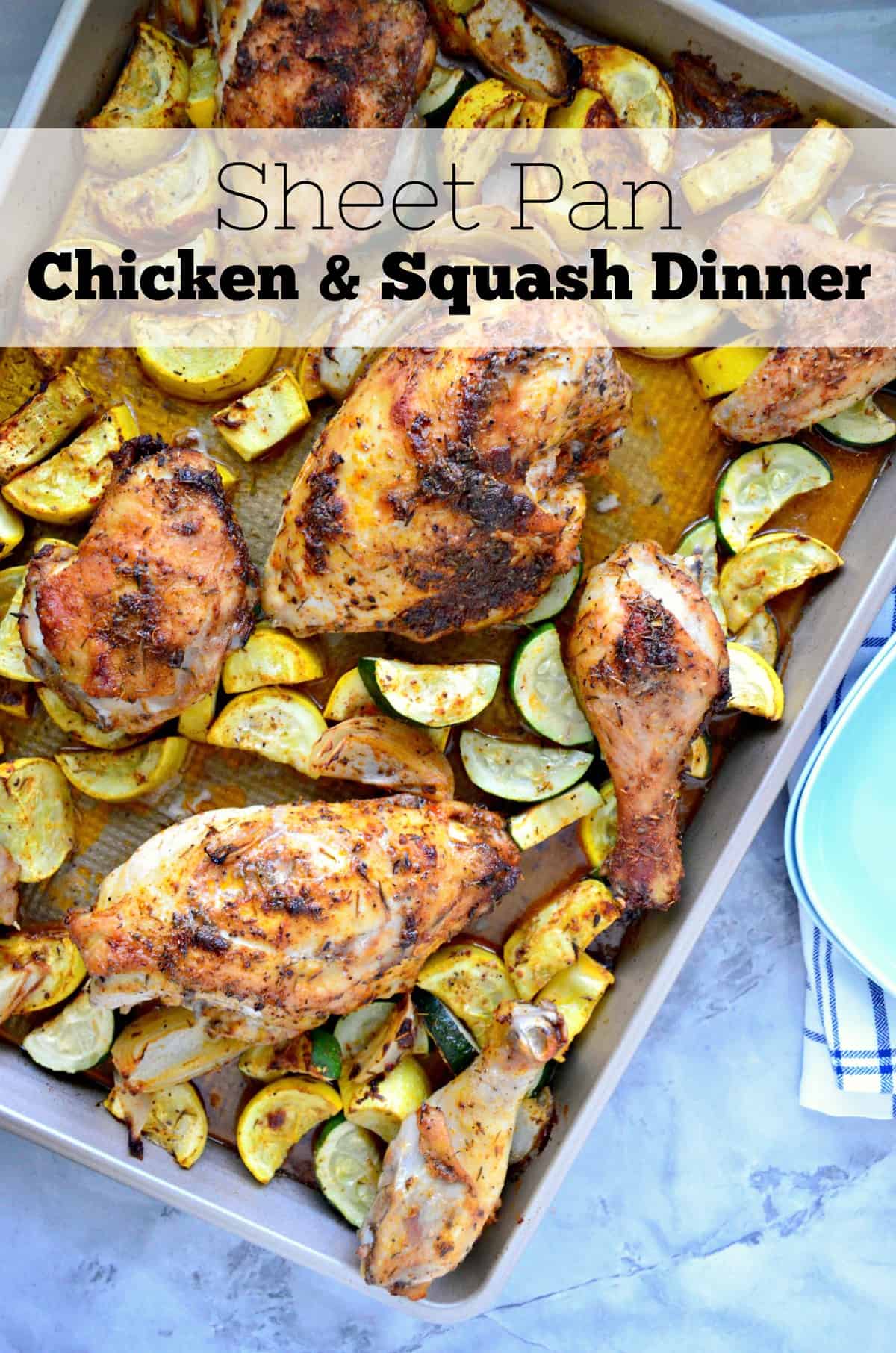 top view of browned chicken and sliced zucchini and squash on sheet pan with title text.