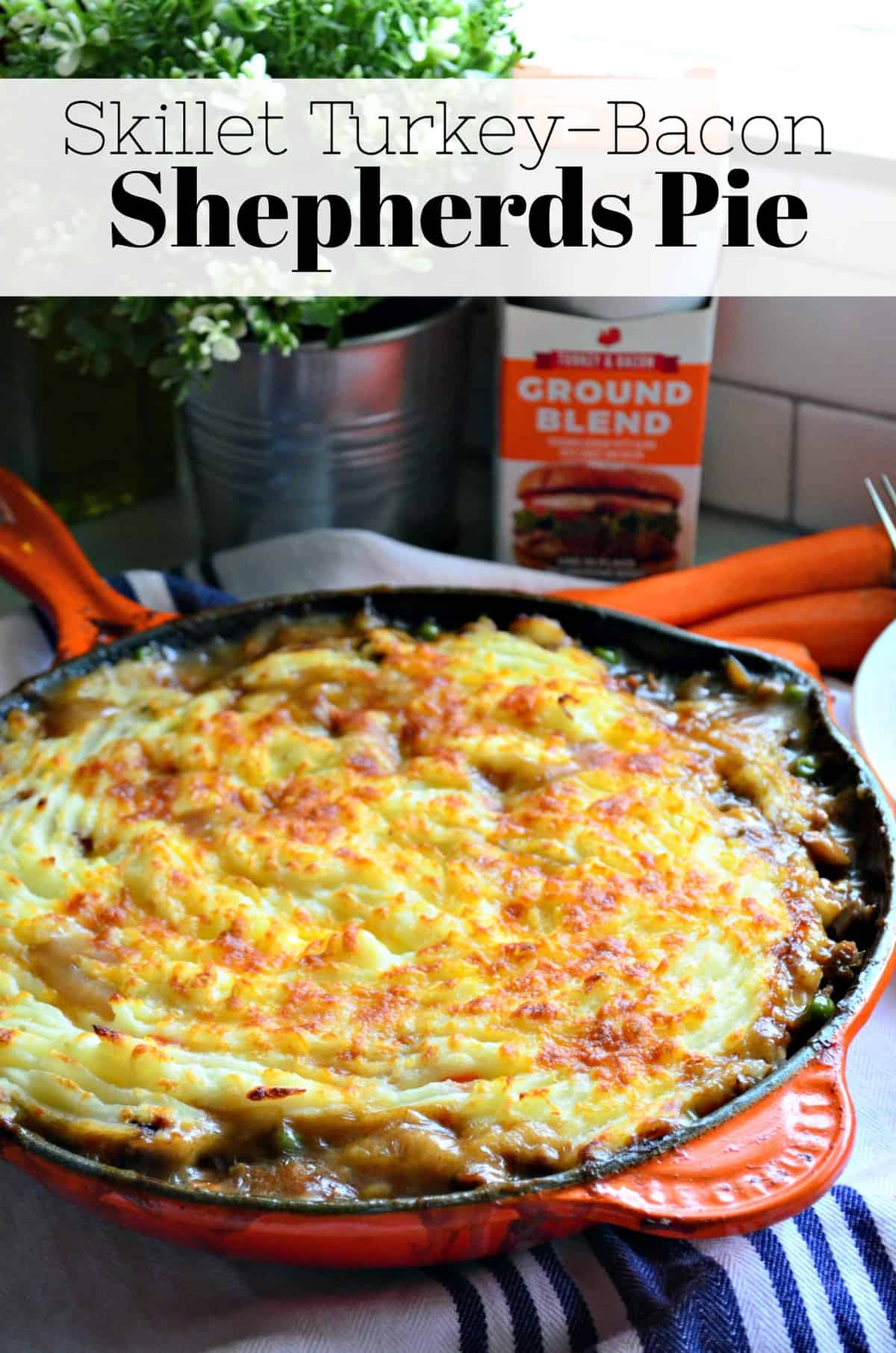 Top view of browned mashed potatoes in skillet over with title text.