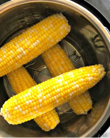 four corn on the cobs in an Instant Pot.