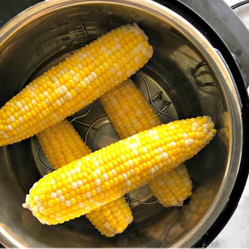 four corn on the cobs in an Instant Pot.