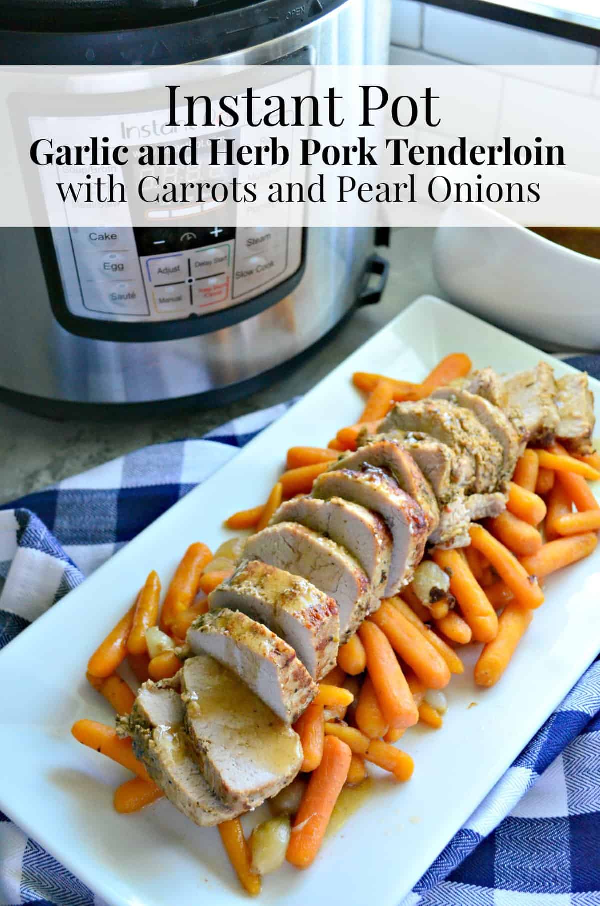 Garlic and Herb Pork Tenderloin with Carrots and Pearl Onions on platter with title text.