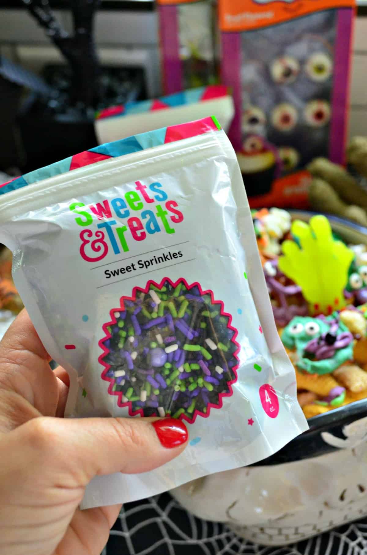 bag of purple, green, and black Sweets & Treats Sweet sprinkles.