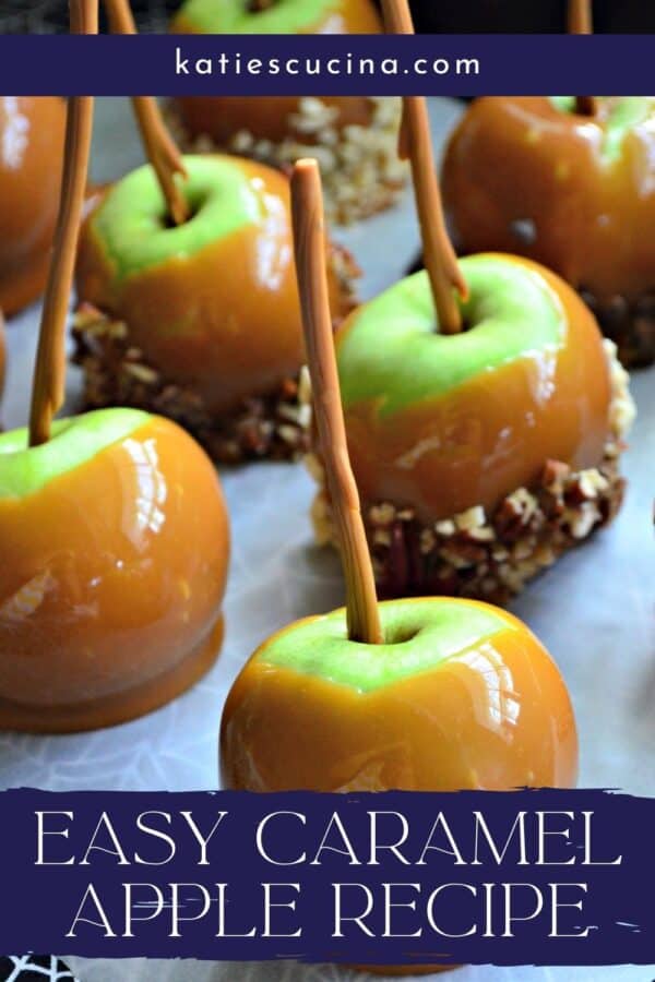 Six caramel apples on parchment with recipe title text on image for Pinterest.