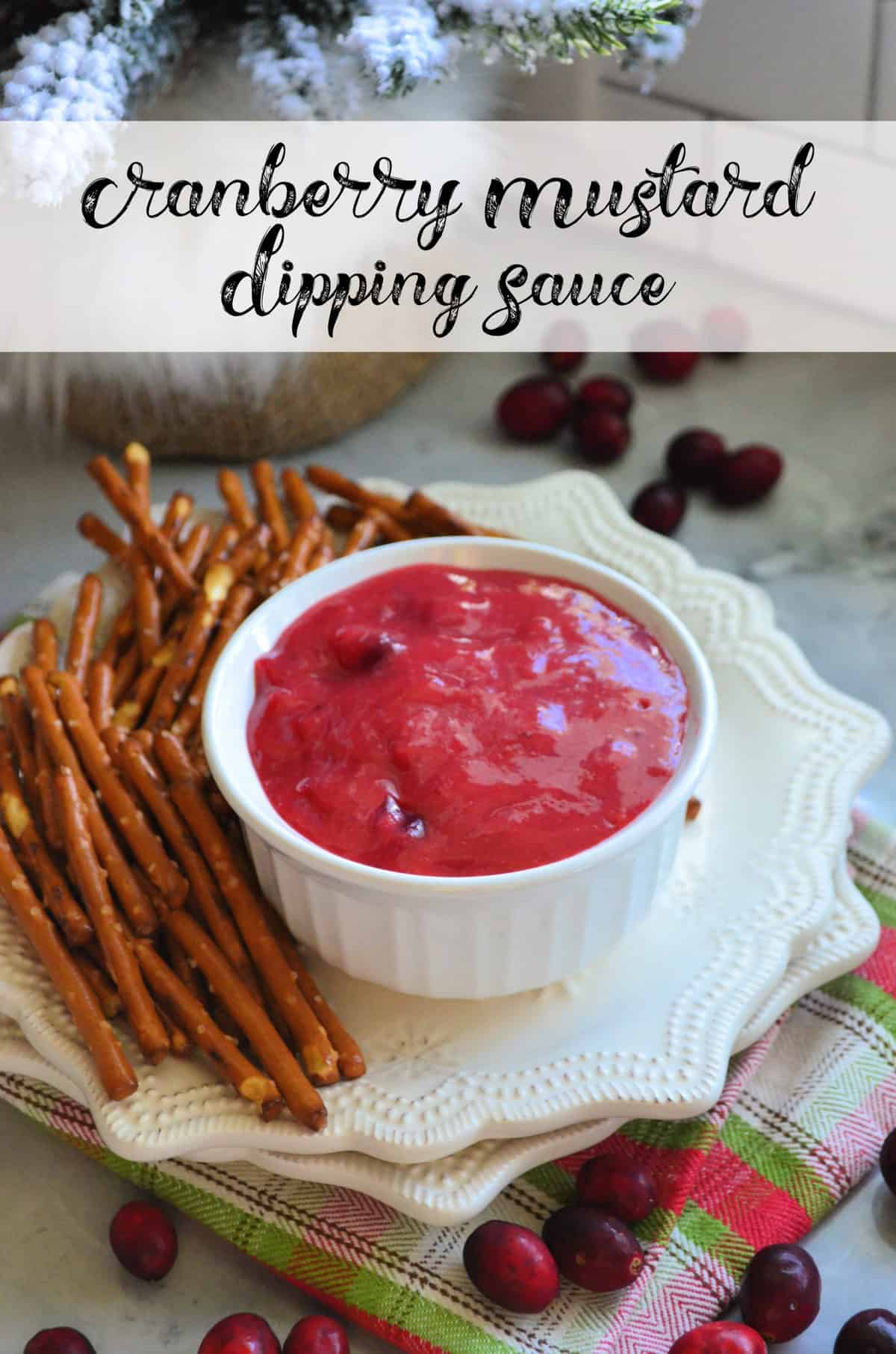 Small bowl of pink sauce on plate with pretzels and title text.