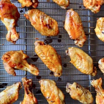 top view of chicken wings on baking rack.