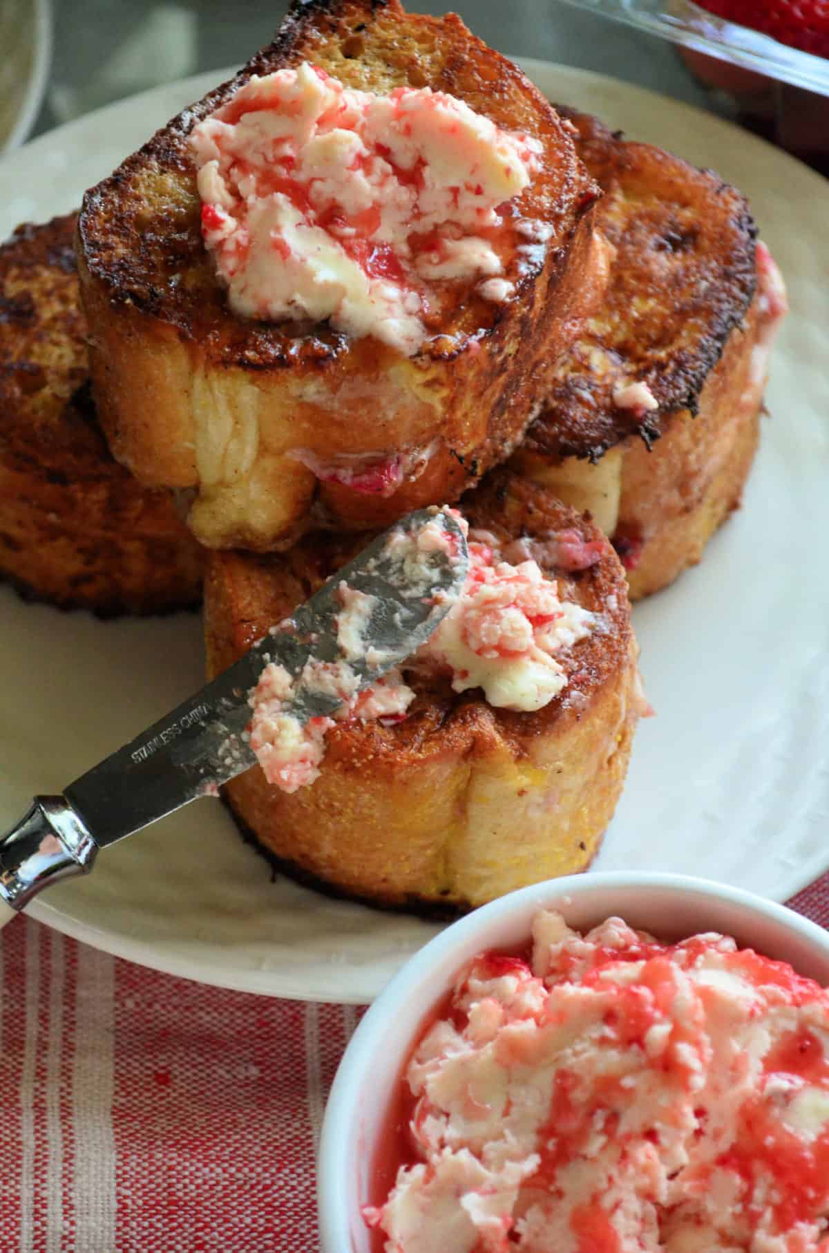 chopped strawberries mixed with butter in small bowl and spread on french toast.