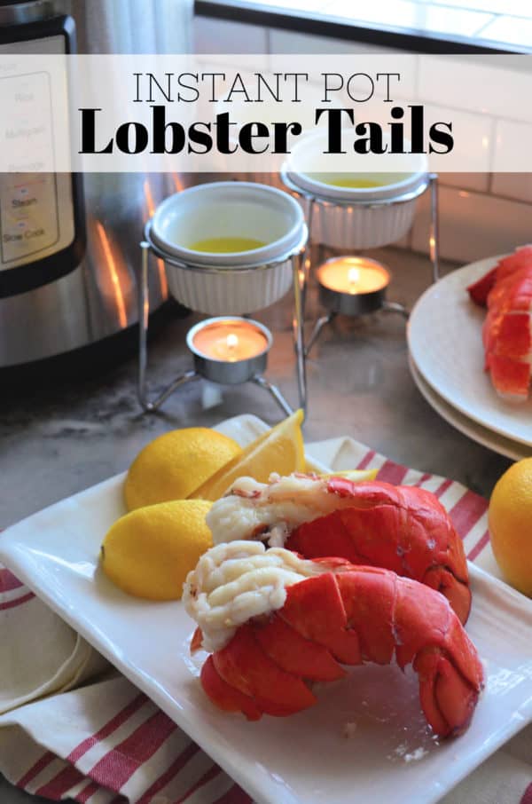 two plated lobster tails served with lemon and butter. Title text.