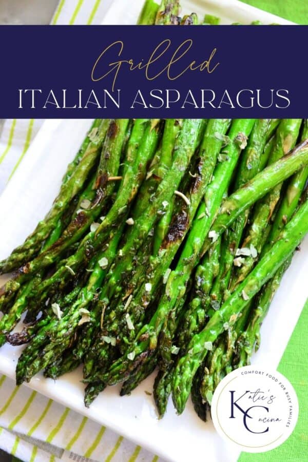 Top view of a white plate filled with asparagus with recipe title text on image.