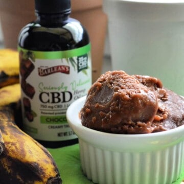 Barlean's CBD bottle next to bananas and bowl of chocolate ice cream.