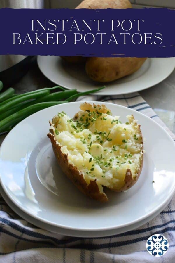 Butter and chive topped baked potato with text on image for Pinterest.