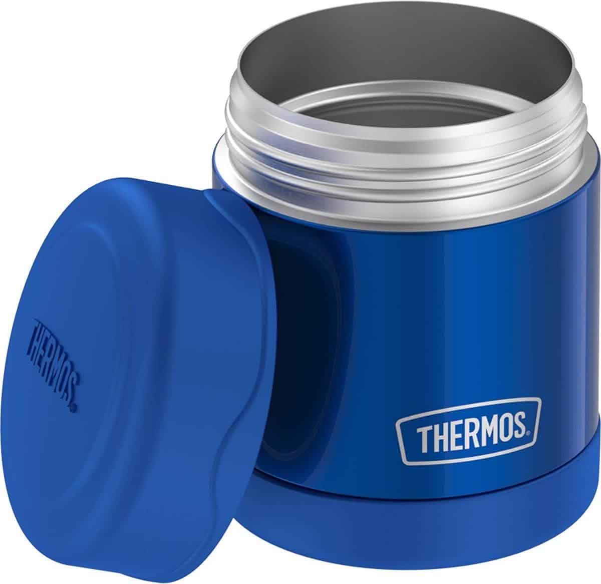 Blue Thermos Funtainer 10 Ounce Food Jar with lid propped against the side.