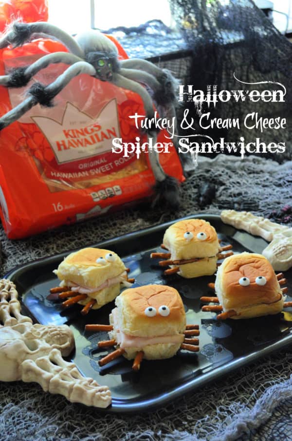 4 spider sandwiches in front of bag of Kings Hawaiian Sweet rolls with pinterest title text.