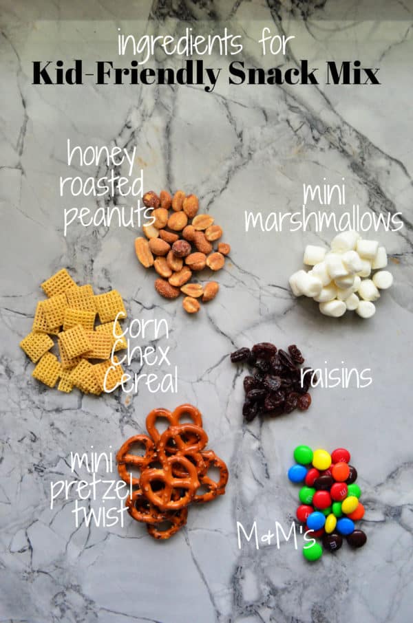 Ingredients for Kid-Friendly Snack Mix laid out in piles on countertop with text labels.