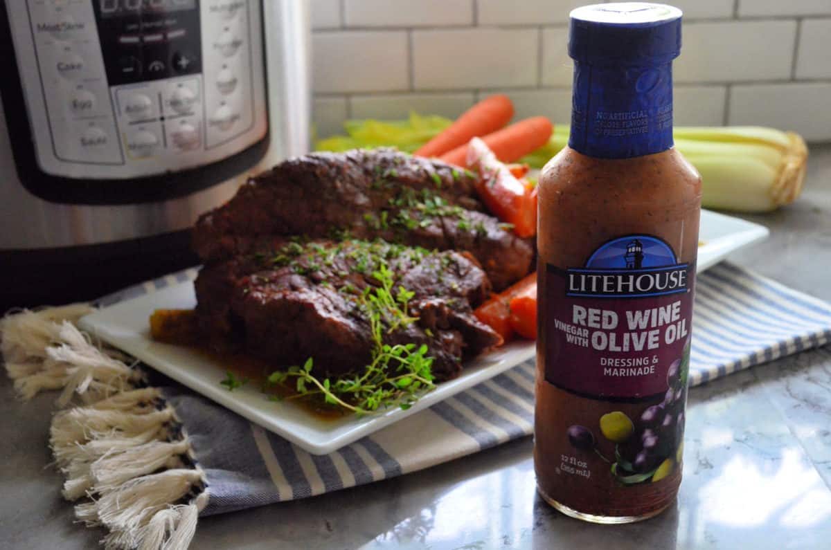 Litehouse Red Wine Vinegar with Olive Oil Dressing & Marinade photo with pot roast in the background.