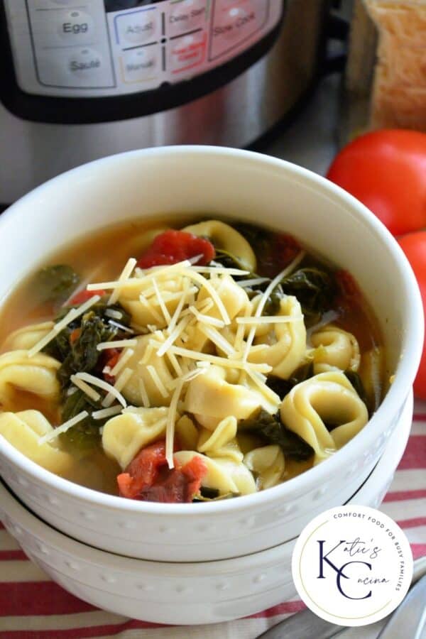 Two white bowls stacked with Tortellini Soup with logo on right corner for Pinterest.