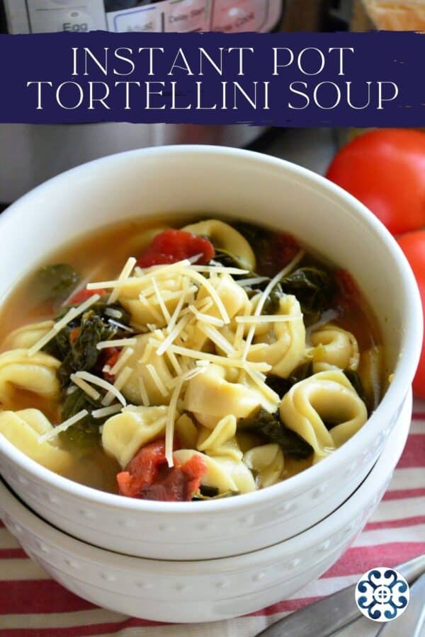 Two white bowls stacked with Tortellini Soup with text on image for Pinterest.