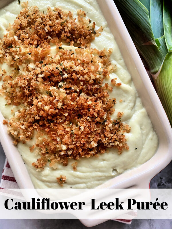 Cauliflower-Leek Puree in a ceramic dish with pinterest title text on photo