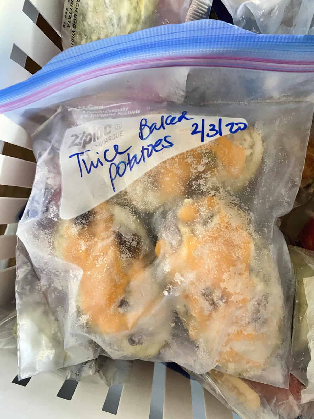 ziploc bag with twice baked potatoes inside and label for freezing.