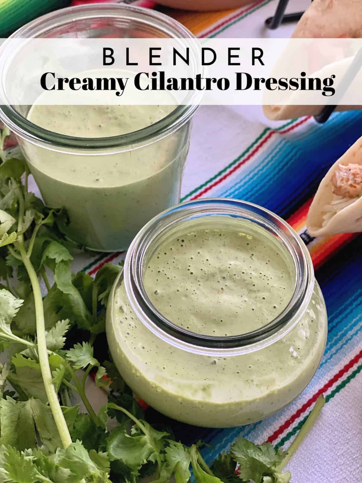 two jars of creamy light green liquid on colorful tablecloth with fresh cilantro and title text.