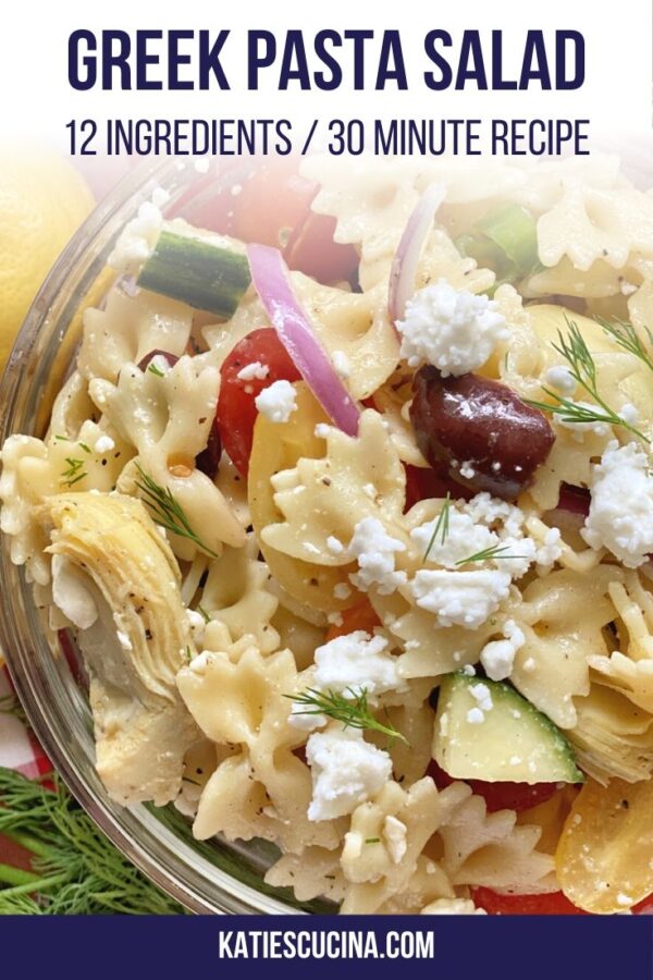 Vertical upclose photo of a bowl of pasta salad with feta cheese.