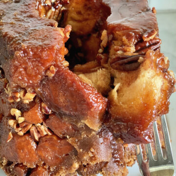 Sticky pull apart bread pulled apart by a fork.