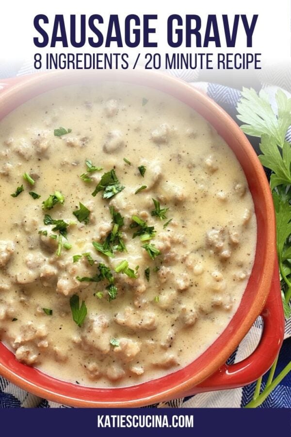 Top view of a red bowl with sausage gravy with pinterest title text.