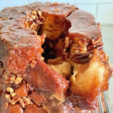 Monkey bread with a piece taken out of it.