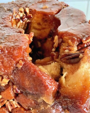 Monkey bread with a piece taken out of it.
