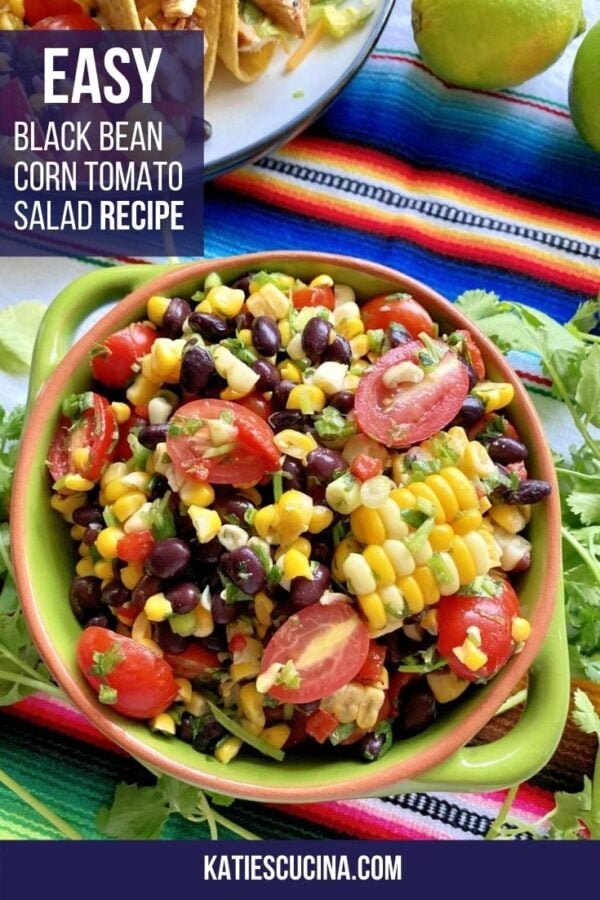 Top view of a green bowl with black beans, tomatoes, and corn with text on image for Pinterest.