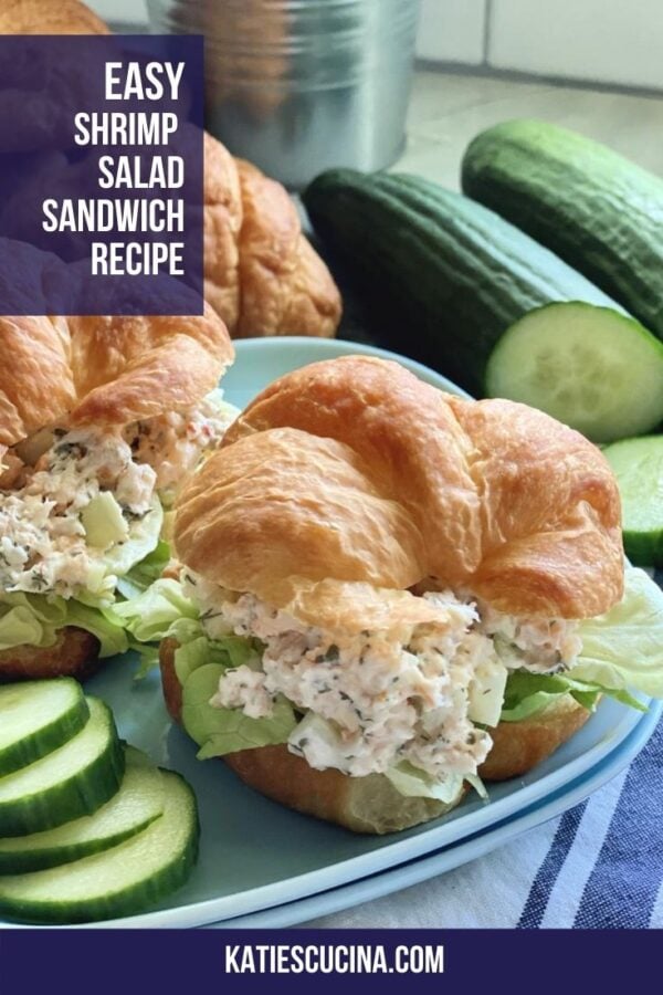 Shrimp salad croissants on a blue plate with text on image for Pinterest.