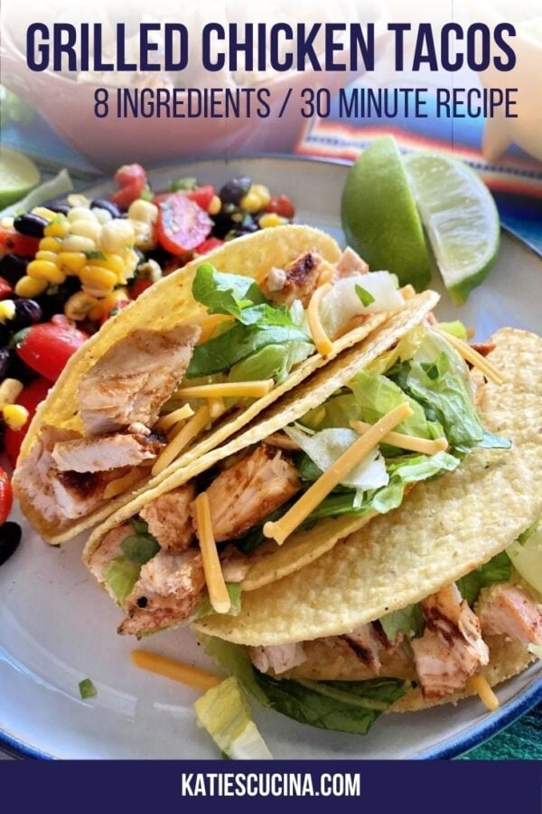 Three crunchy hard shell tacos with chicken on a plate with text on image for Pinterest.