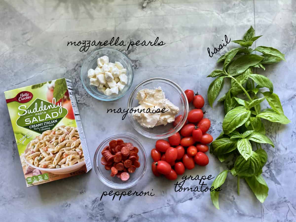 Ingredients: Suddenly Pasta Salad, mozzarella, mayonnaise, pepperoni, tomatoes, basil.