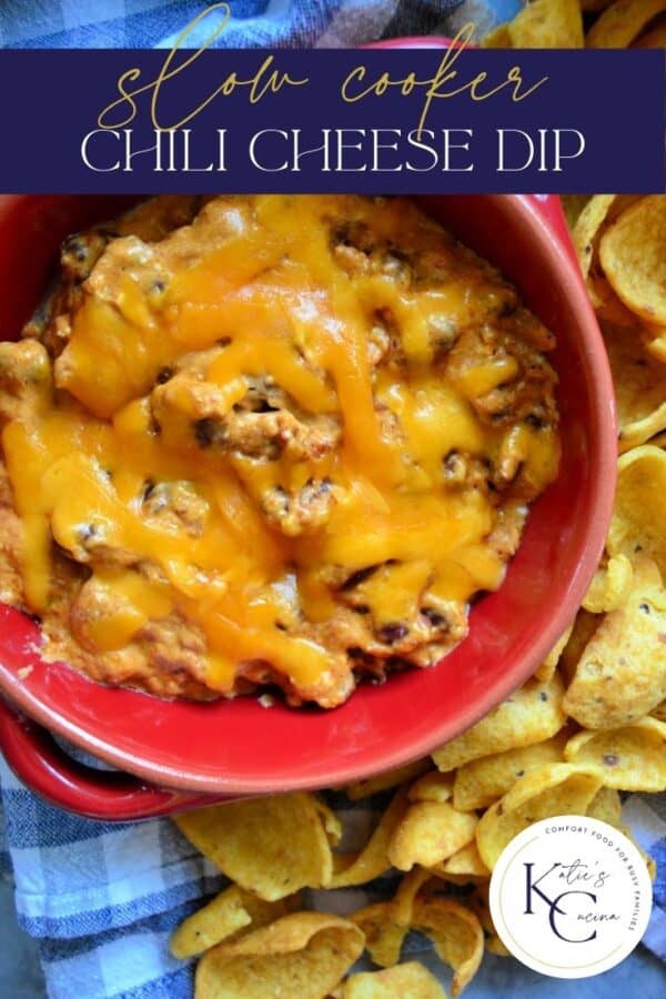Top view of a red bowl filled with a cheese dip with text on image for Pinterest.