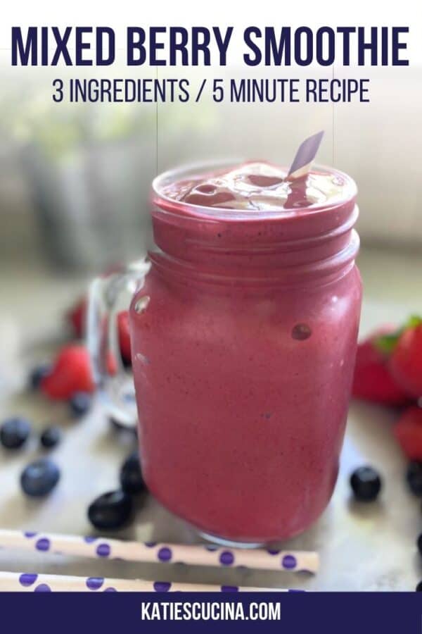 Purple smoothie in a glass mason jar with berries and straws on counter with text on image for Pinterest.