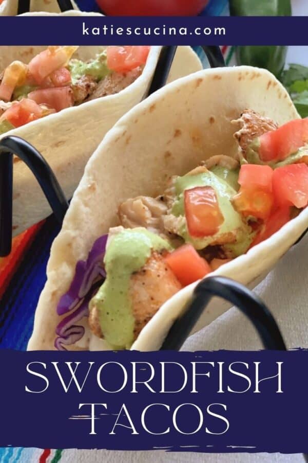 Close up of one soft taco with fish and diced tomatoes with text on image for Pinterest.