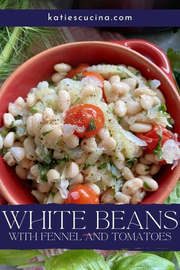 Top view of a red bowl filled with white beans, tomatoes, and herbs with text on image for Pinterest.