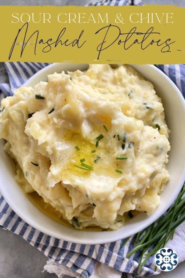 Bowl of mashed potatoes with butter and chives with text on image for pinterest.