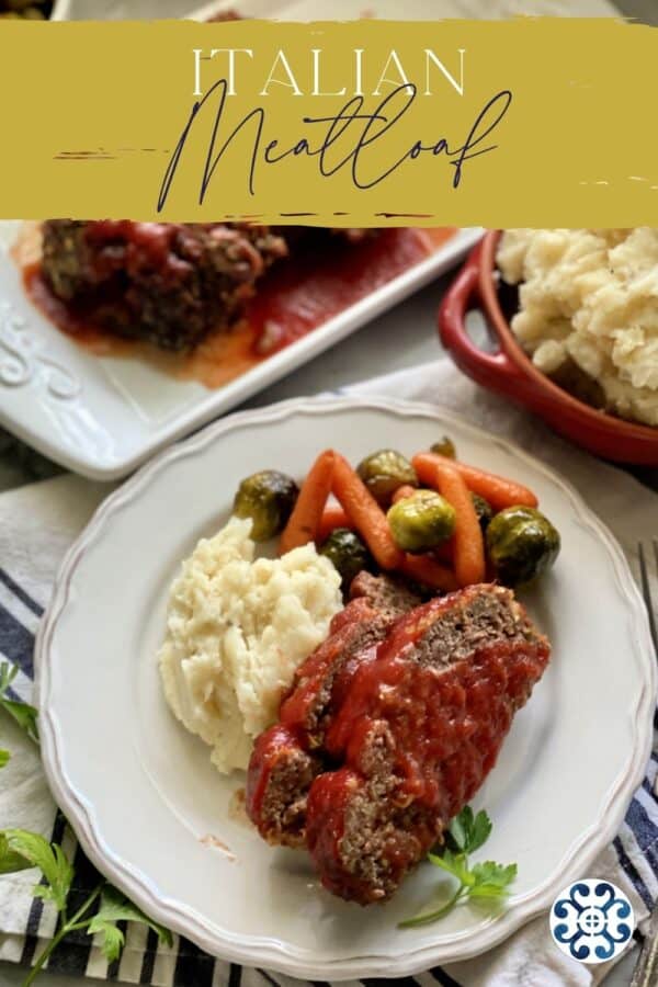 Top view of a meatloaf dinner on a white plate with text on image for Pinterest.