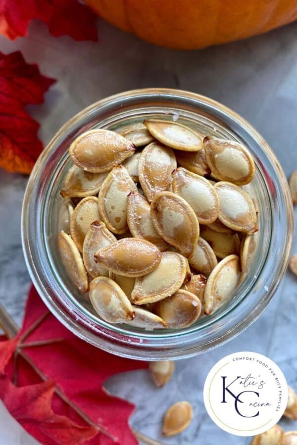 Top view of a glass jar filled with Pumpkin Seeds.