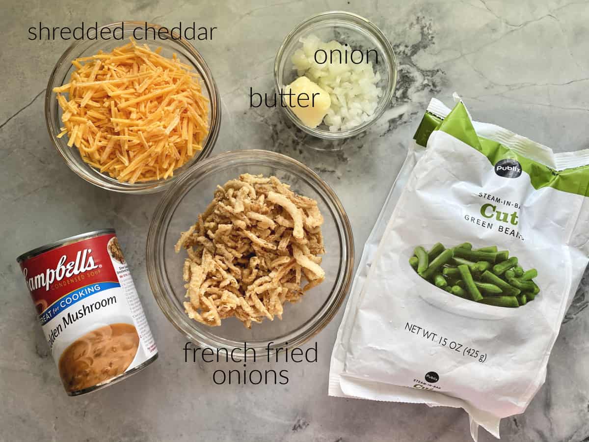 Ingredients: cheddar, onion, butter, fried onions, green beans, and mushroom soup.