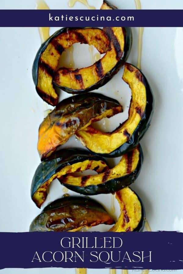 Top view of sliced acorn squash with text on image for Pinterest.