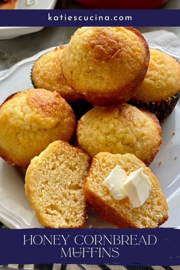 Top view of cornbread muffins, one sliced with butter on it with text on image for Pinterest.